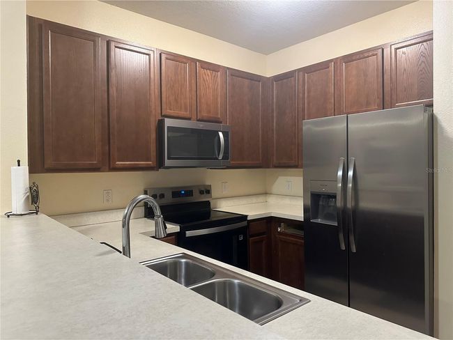 1303 - 10636 Regent Square Dr, Condo with 3 bedrooms, 3 bathrooms and null parking in Orlando FL | Image 11