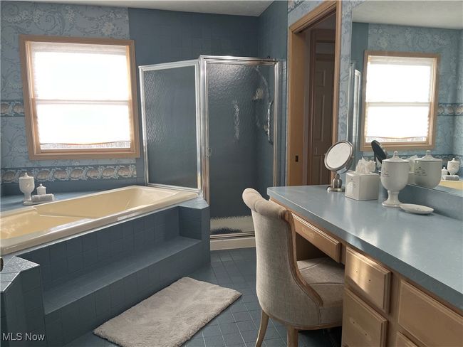 Ensuite Bathroom with shower with separate bathtub . | Image 22