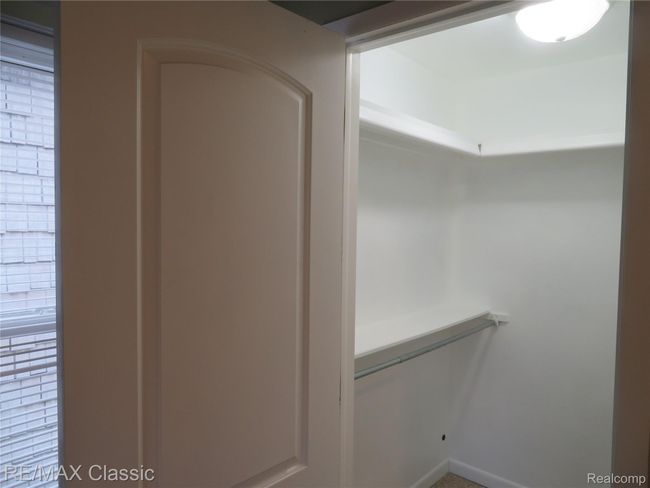 Walk-in closet in the master bedroom. | Image 17