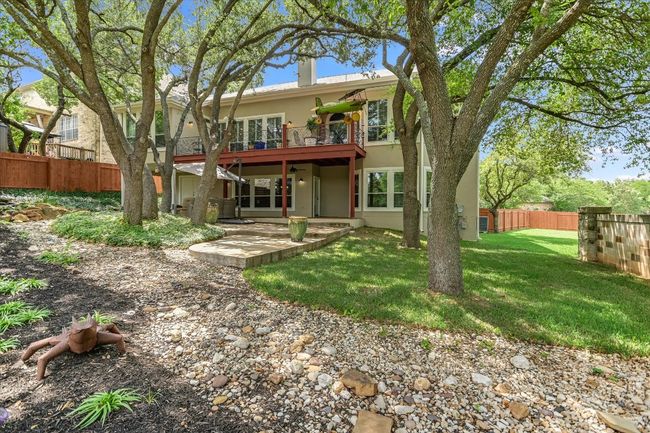 Back of house featuring stucco siding and a patio | Image 28