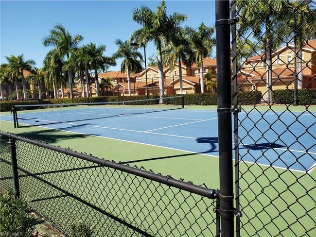 View of sport court featuring fence | Image 38