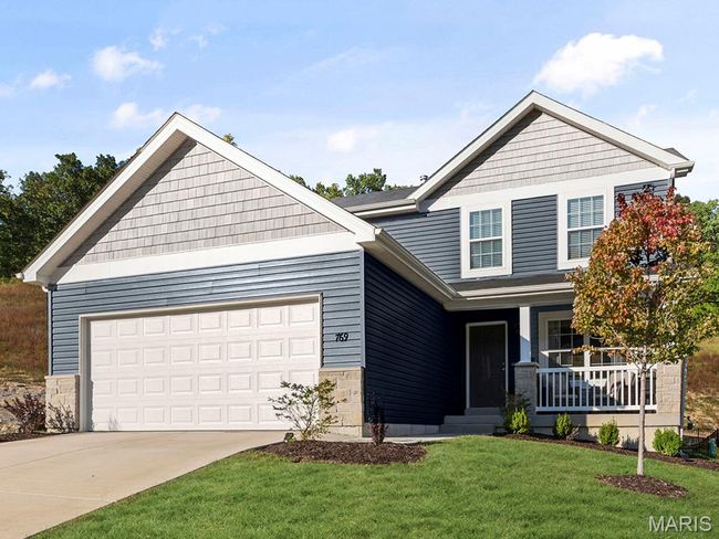 Craftsman house featuring a porch, concrete driveway, a front yard, a garage, and stone siding | Image 26