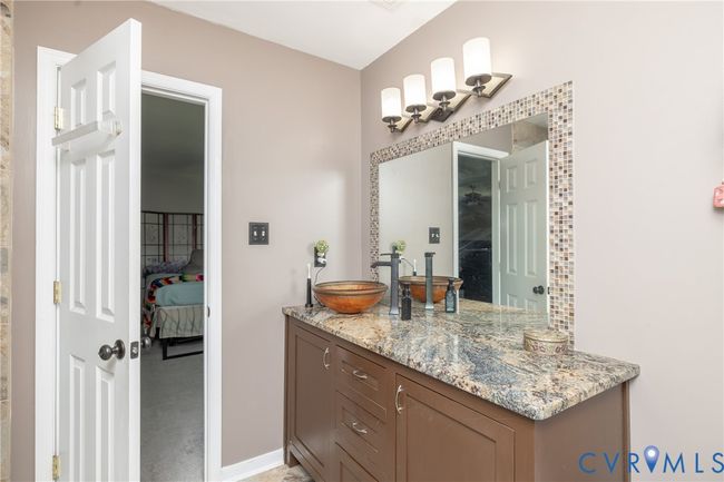 Bathroom with vanity and baseboards | Image 44