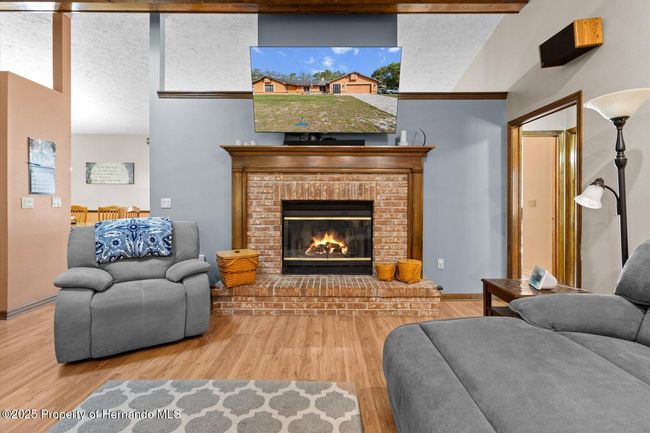 Family Room with wood burning fireplace | Image 12