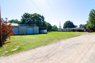 8845 Carraway Lane, House other with 3 bedrooms, 2 bathrooms and null parking in Magnolia TX | Image 2