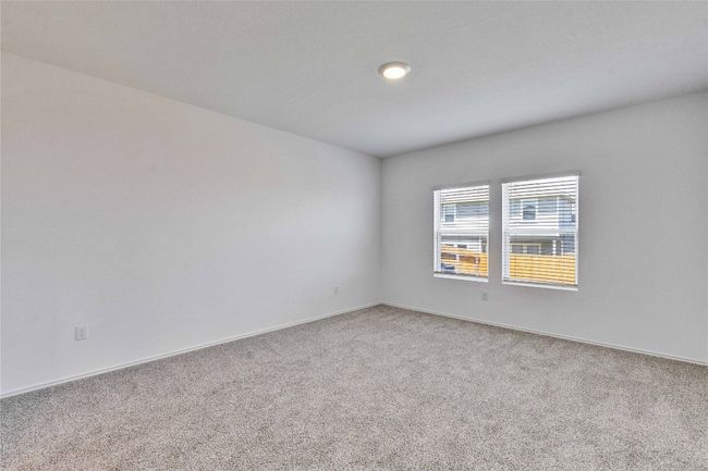 12305 Bulldogger Bnd, House other with 4 bedrooms, 3 bathrooms and 4 parking in Mustang Ridge TX | Image 12