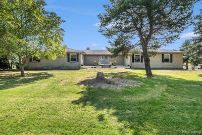 12579 Hill Road, Home with 3 bedrooms, 3 bathrooms and null parking in Riley Twp MI | Image 1