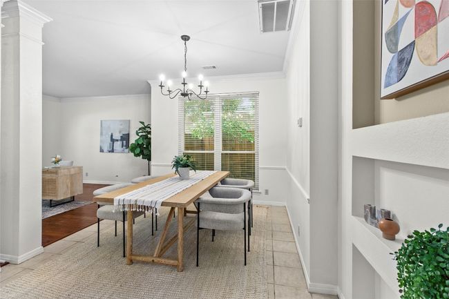 This dining area is located near the kitchen | Image 14