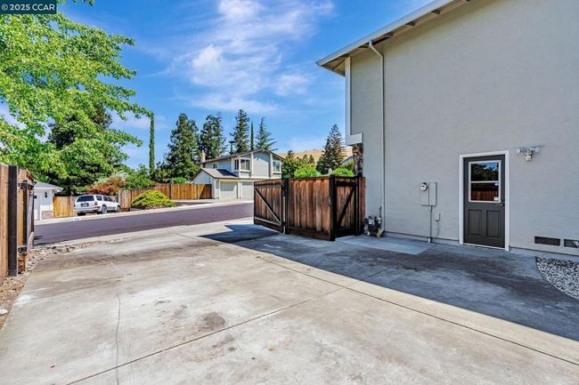 Double wide side yard for RV or toy storage. | Image 35