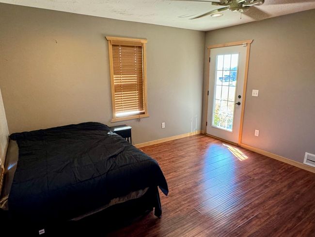 Main floor bedroom, has private entrance for home office use | Image 24