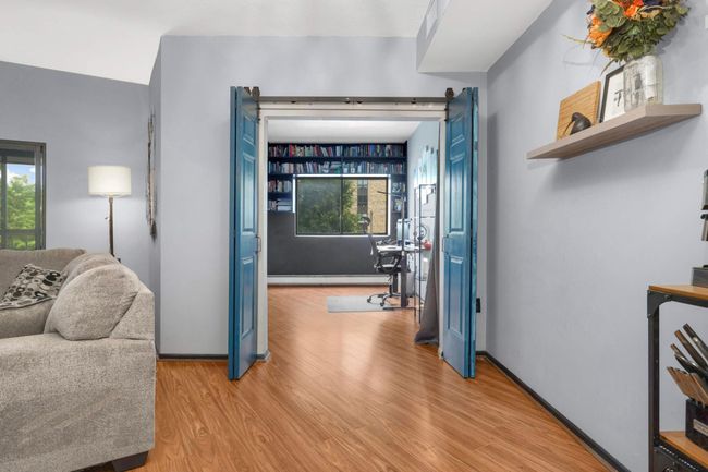 Den converted into a second bedroom with added doors | Image 13