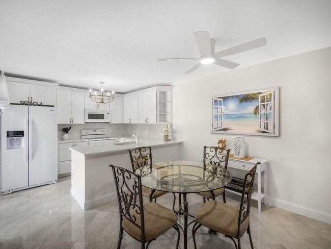 1206 12 Th Ct, Condo with 2 bedrooms, 3 bathrooms and null parking in Jupiter FL | Image 4