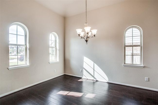Formal Dining room with Lots of windows providing natural lighting | Image 5