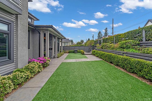 View of yard featuring a fenced backyard | Image 4