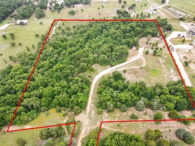 Aerial view of sparsely populated area with property parcel outlined | Image 13