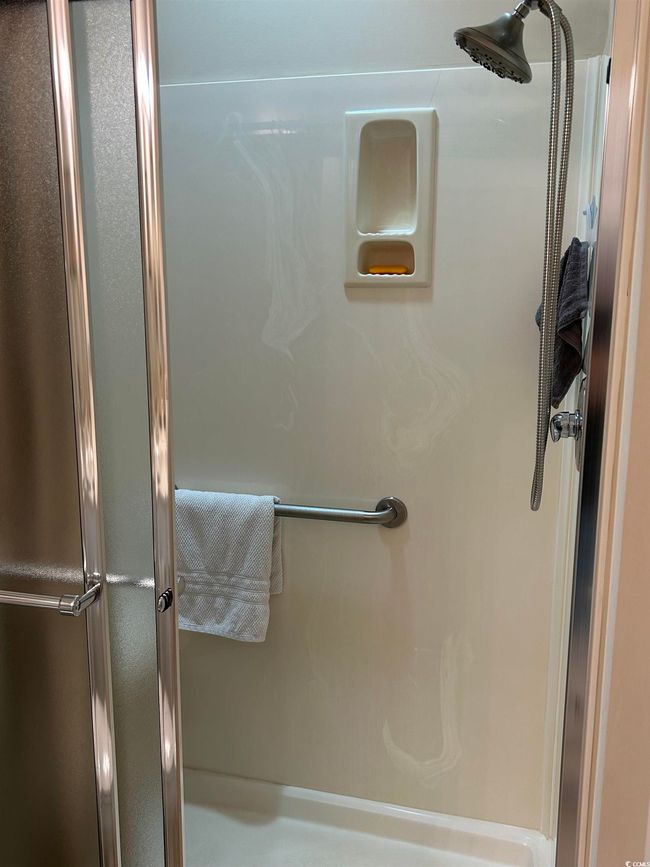 Bathroom with a stall shower | Image 12