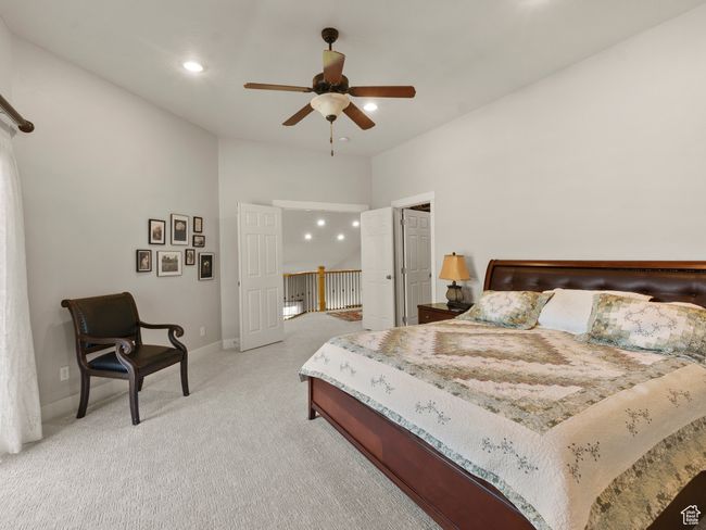 Bedroom with light carpet, baseboards, recessed lighting, and a ceiling fan | Image 16