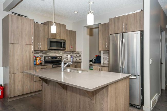 364 Redstone Drive Ne, Home with 4 bedrooms, 3 bathrooms and 2 parking in Calgary AB | Image 6