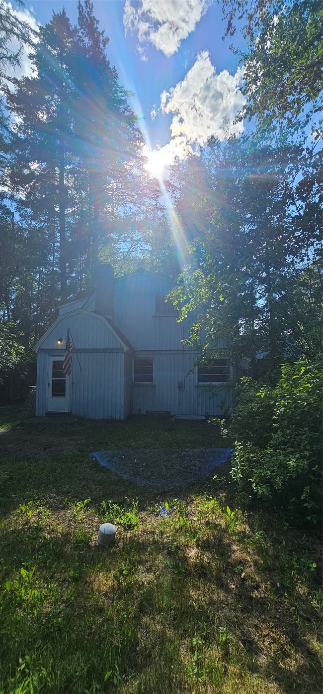 View of yard with an outbuilding and a barn | Image 28