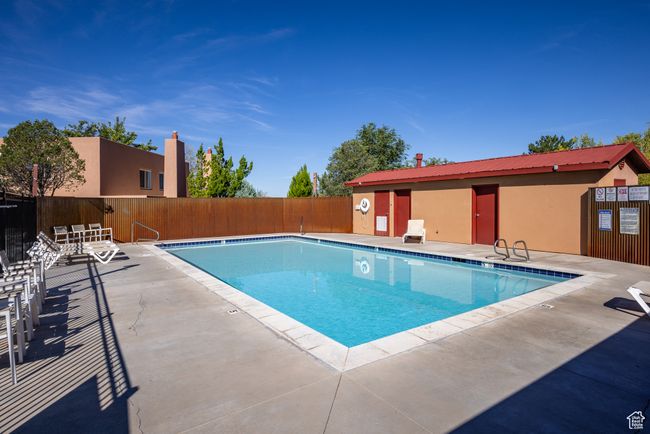 View of swimming pool featuring a patio area | Image 37