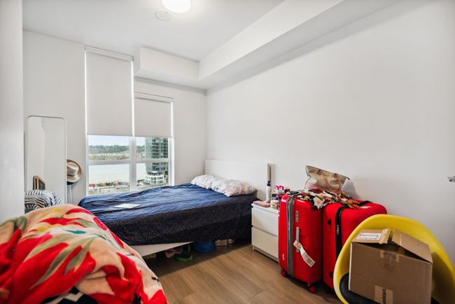 Bedroom with wood finished floors | Image 13