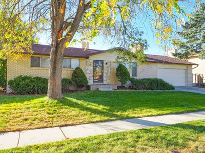 2319 W Ledgewood Dr, House other with 5 bedrooms, 2 bathrooms and 2 parking in Taylorsville UT | Image 2