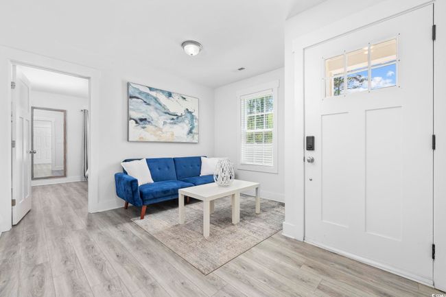 Foyer with light wood-type flooring and baseboards | Image 23