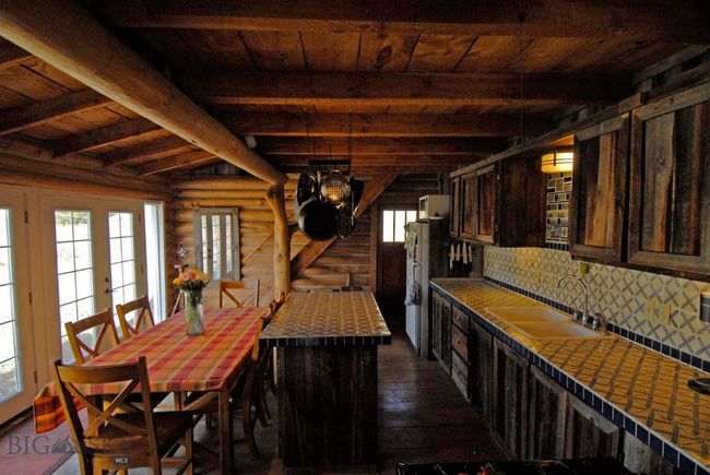 Yellowstone Cabin Kitchen and Dining Area | Image 11