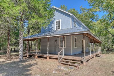 Country-style home with a porch | Image 3