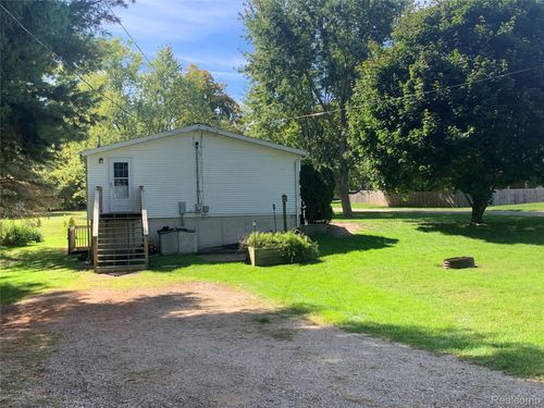 310 E Orchard St, Perry, MI, 48872-8129 | Card Image