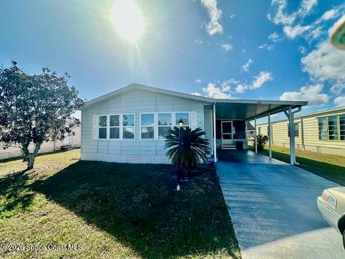 919 Jacaranda Dr, Barefoot Bay, FL, 32976-7105 | Card Image