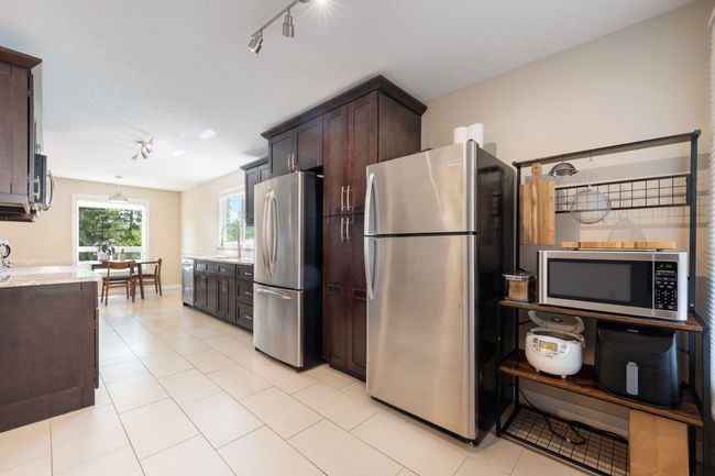 8003 Ranchview Drive Nw, House other with 4 bedrooms, 3 bathrooms and 3 parking in Calgary AB | Image 9