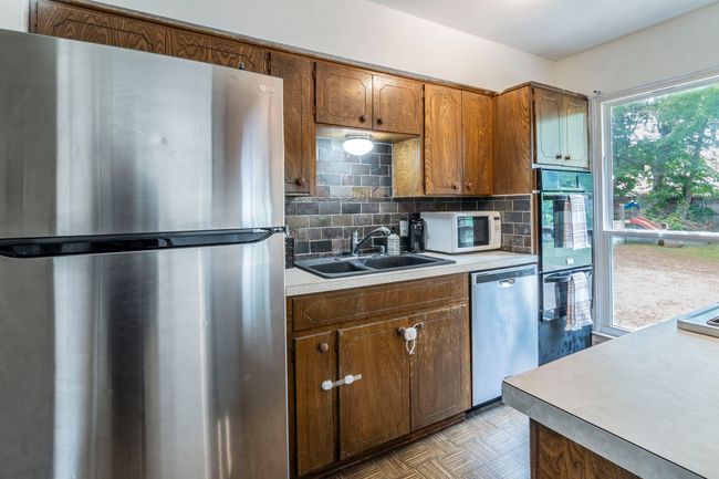 Galley kitchen with tons of potential. | Image 8