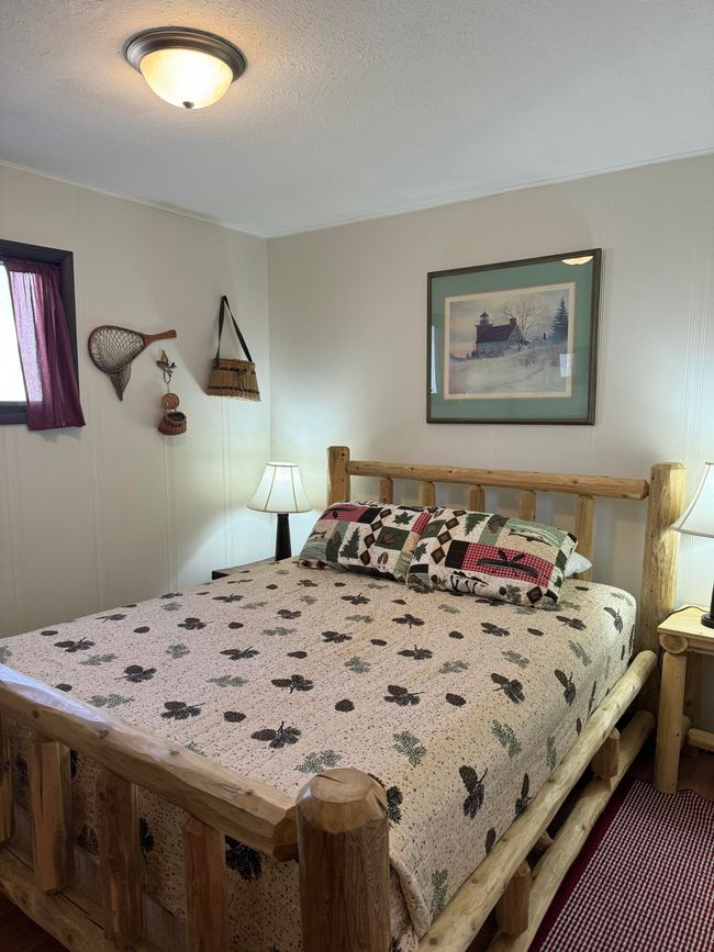 8288 Portage St, House other with 4 bedrooms, 3 bathrooms and null parking in Onekama MI | Image 13