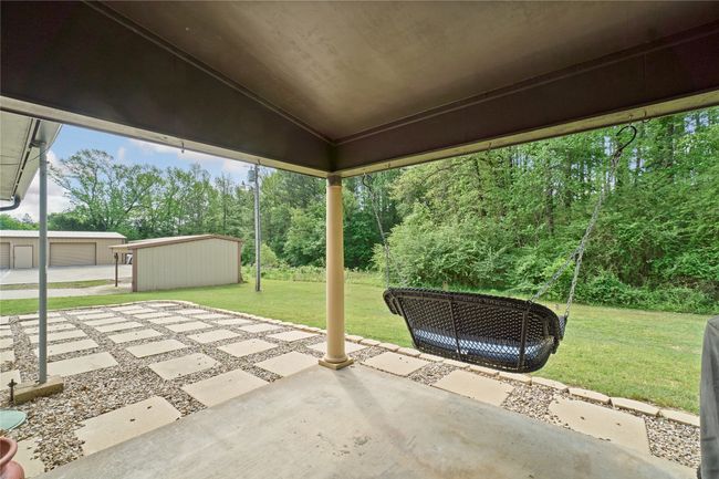 View of patio with an outbuilding | Image 26