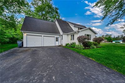 Newer blacktop driveway with turnaround and plenty of parking | Image 3