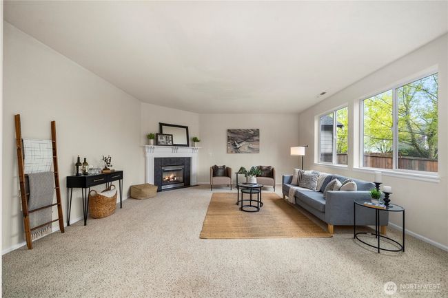 The living room is massive and is open to the large kitchen + dining room | Image 5