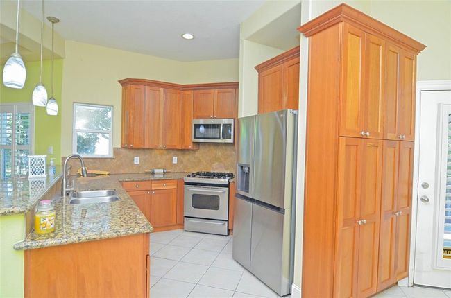 Stainless steel appliances, gas stove. | Image 14