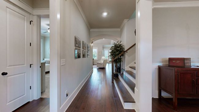 Step inside to soaring ceilings, rich hardwood floors, and a grand hallway that creates the perfect flow from the entry to the heart of the home. Every detail feels thoughtfully designed and beautifully finished. | Image 15