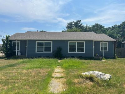 Duplex featuring a front lawn | Image 1