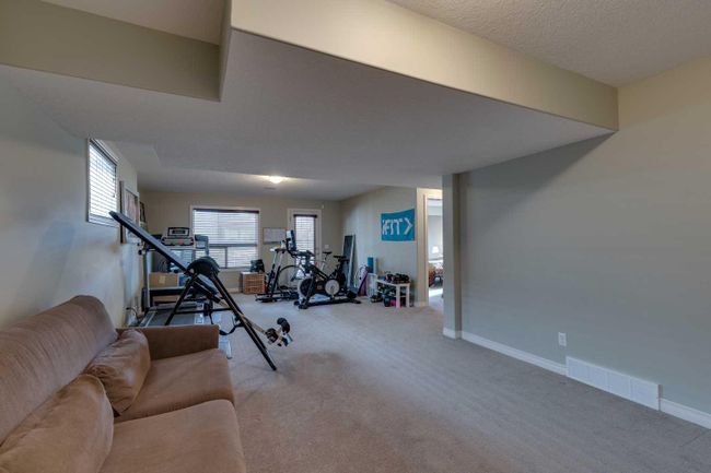 144 Westland Street, Home with 4 bedrooms, 3 bathrooms and 4 parking in Okotoks AB | Image 30