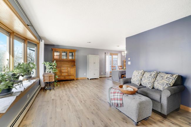 Greet your guest and relax in the formal living area off of the front entry. | Image 13