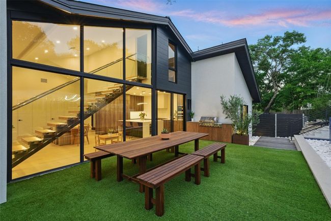 View of back of house at dusk | Image 8