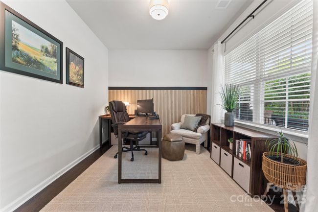 A private office with French Doors at the front of the house, away from the main living space. | Image 7