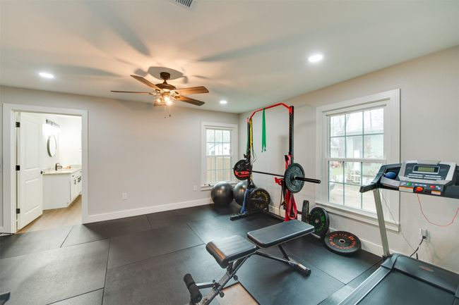 Workout room featuring baseboards, a ceiling fan, and recessed lighting | Image 7