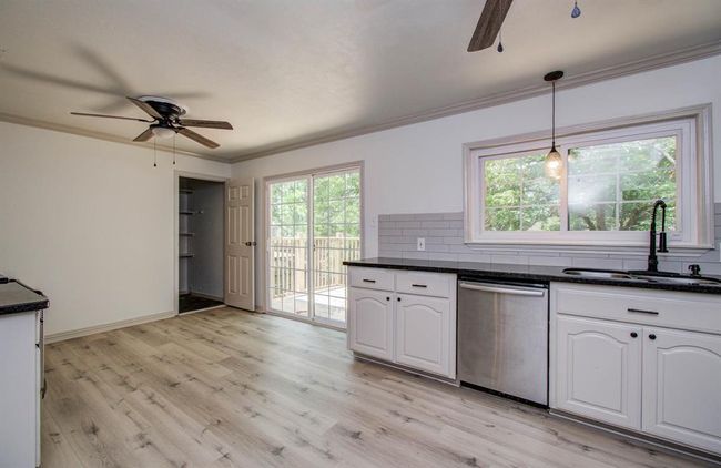 Kitchen has room for a breakfast area. | Image 16