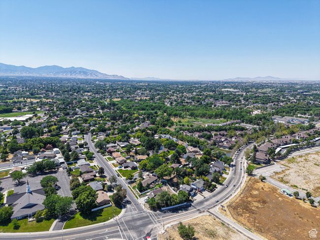 Aerial view of residential area with mountains | Image 24