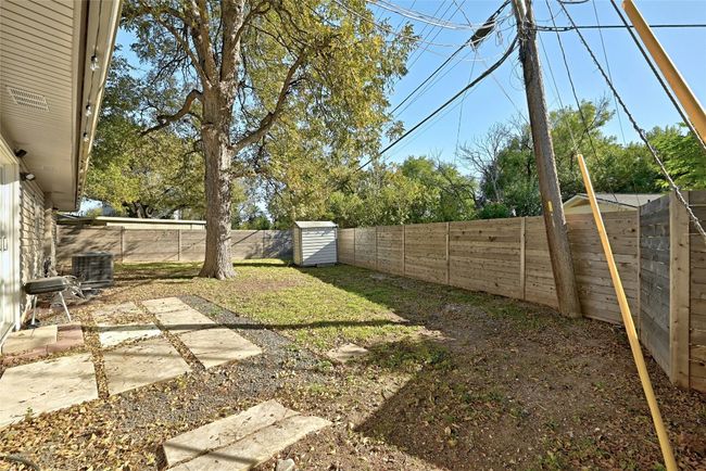 Entertaining is a breeze in this fully-fenced, well-kept backyard. | Image 29