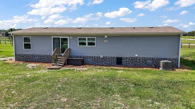 8507 Strawberry Fields Ct, House other with 4 bedrooms, 2 bathrooms and null parking in HOWEY IN THE HILLS FL | Image 27