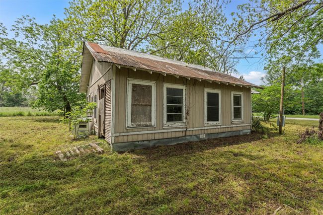 View of home's exterior with a yard | Image 14